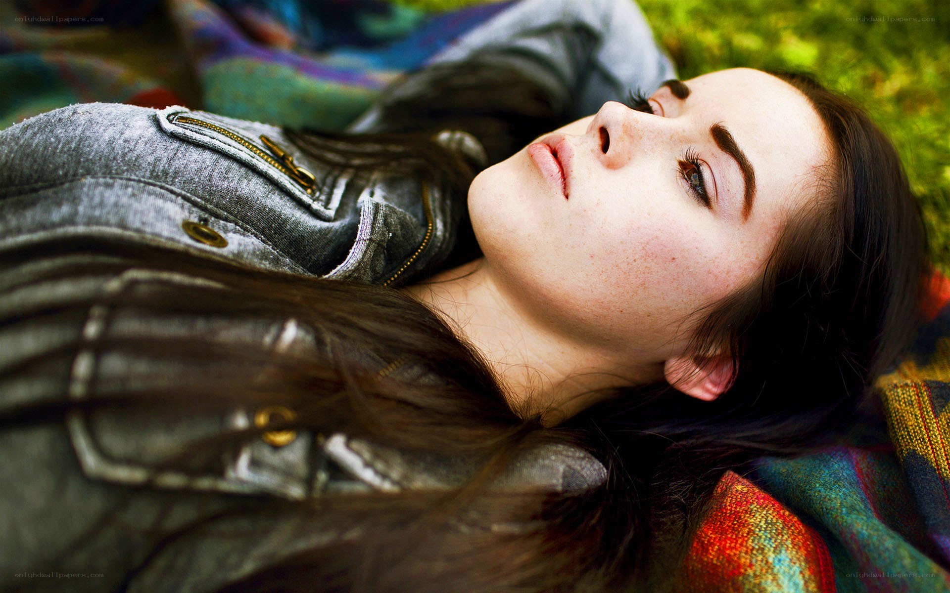 woman lying on grass