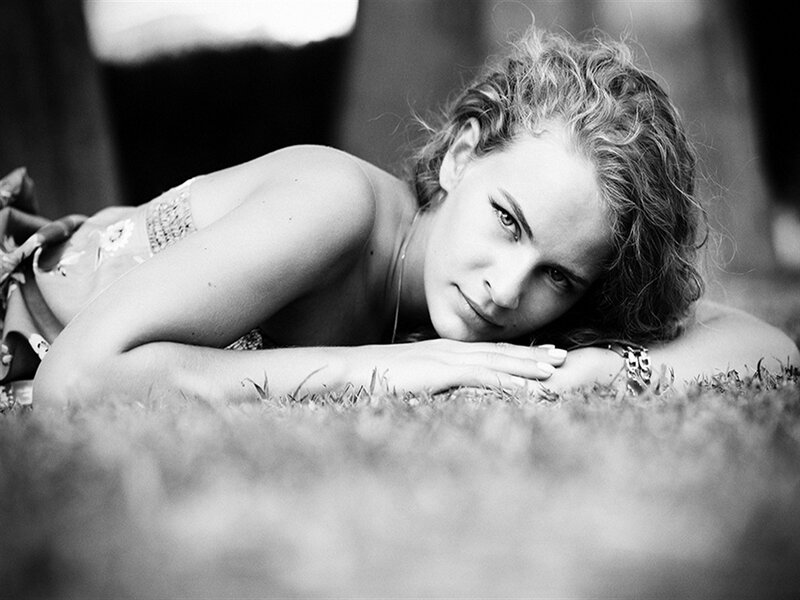 Woman Lying on Grass — Black, Calm, Photograph