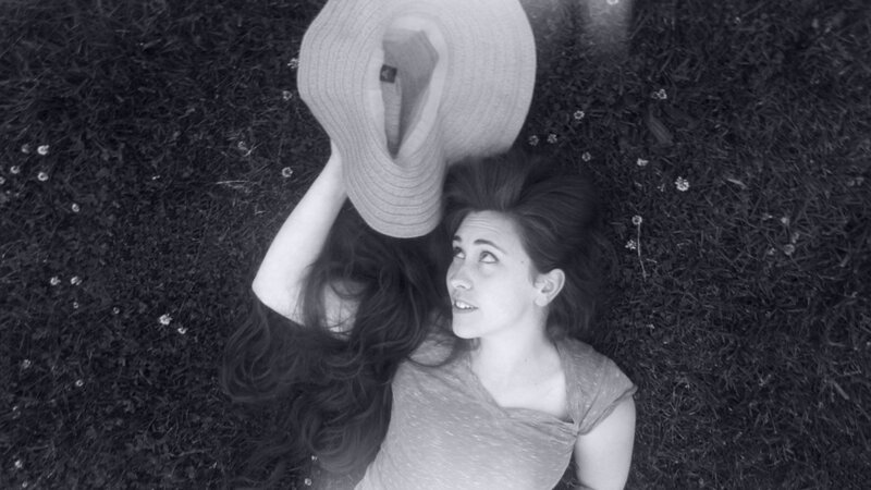 Woman Lying on Grass — Black, Calm