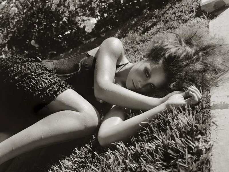 Woman Lying on Grass — Black, Relaxed