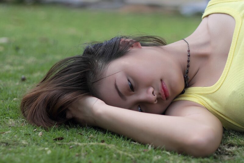 Woman Lying on Grass — Green, Calm, Afternoon, Photograph, Necklace