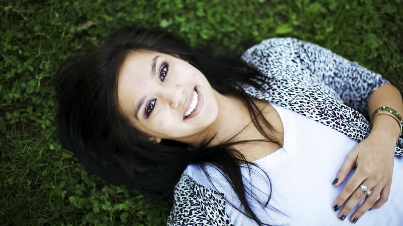 Woman Lying on Grass — Green, Relaxed, Afternoon, Photograph, Leopard Print Jacket