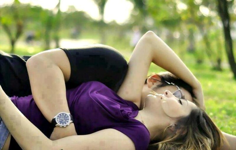Woman Lying on Grass — Purple, Relaxed