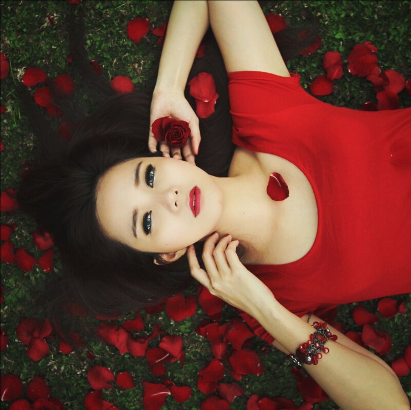 Woman Lying on Grass — Red, Serene