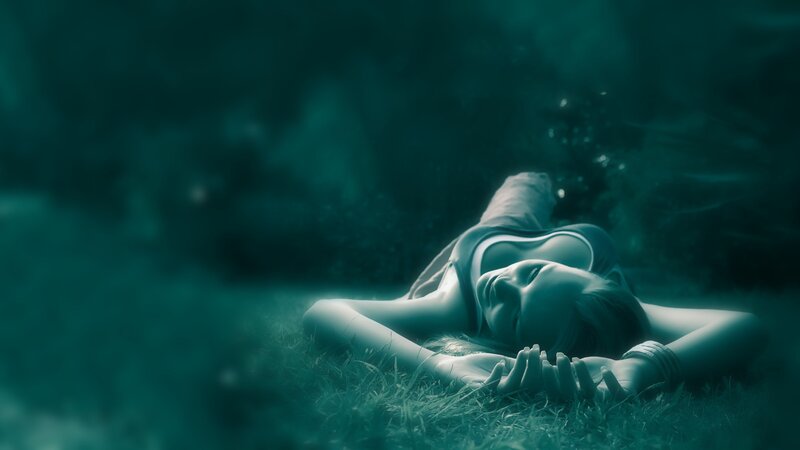 Woman Lying on Grass — Teal