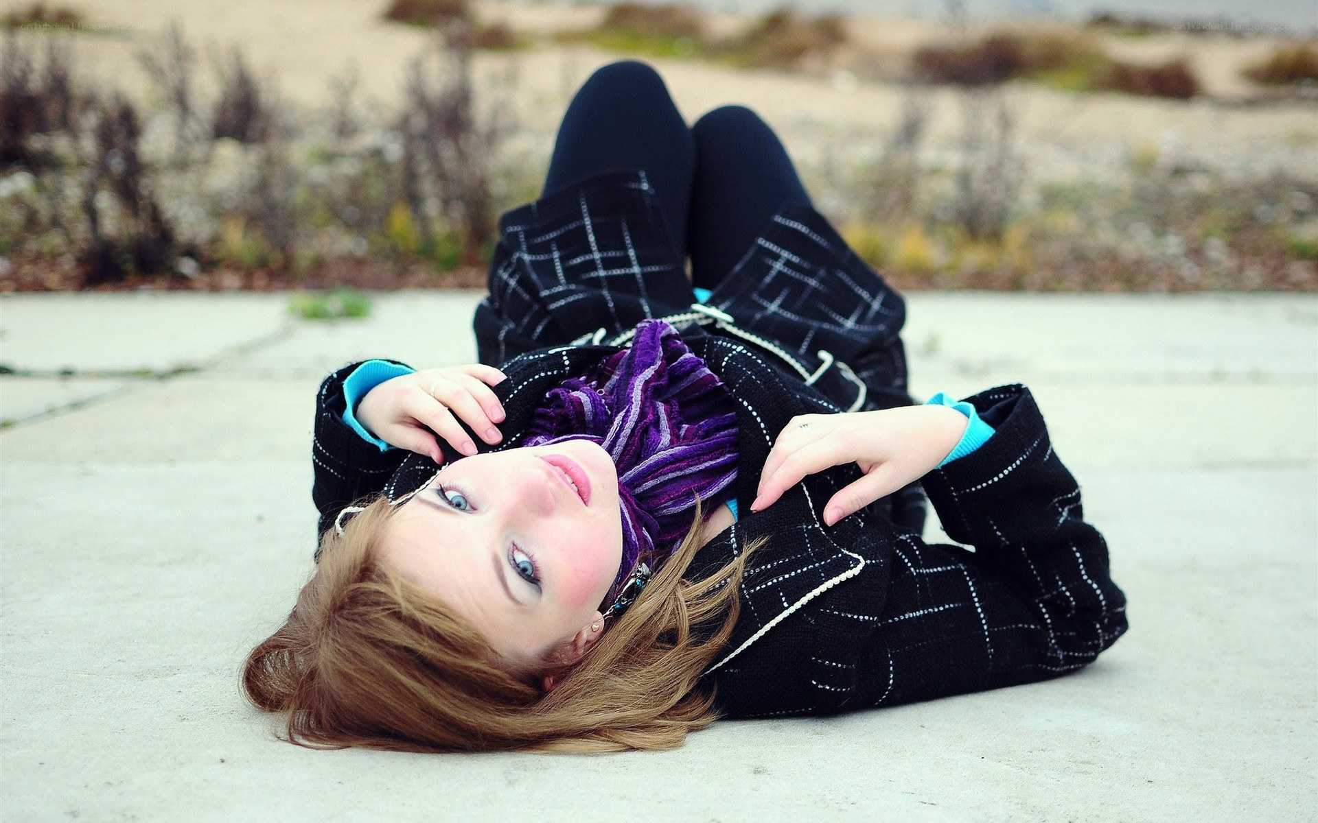 woman lying on ground