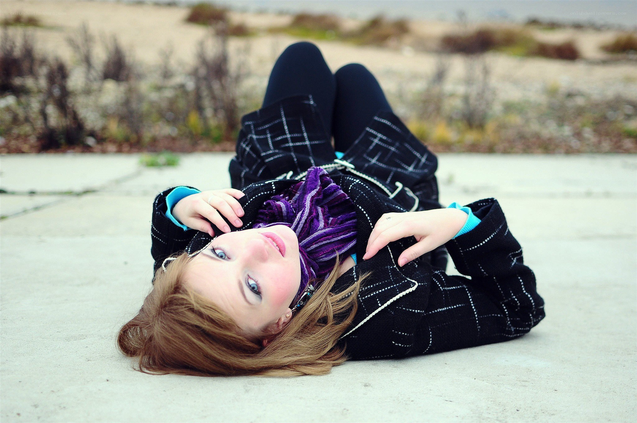 woman lying on ground