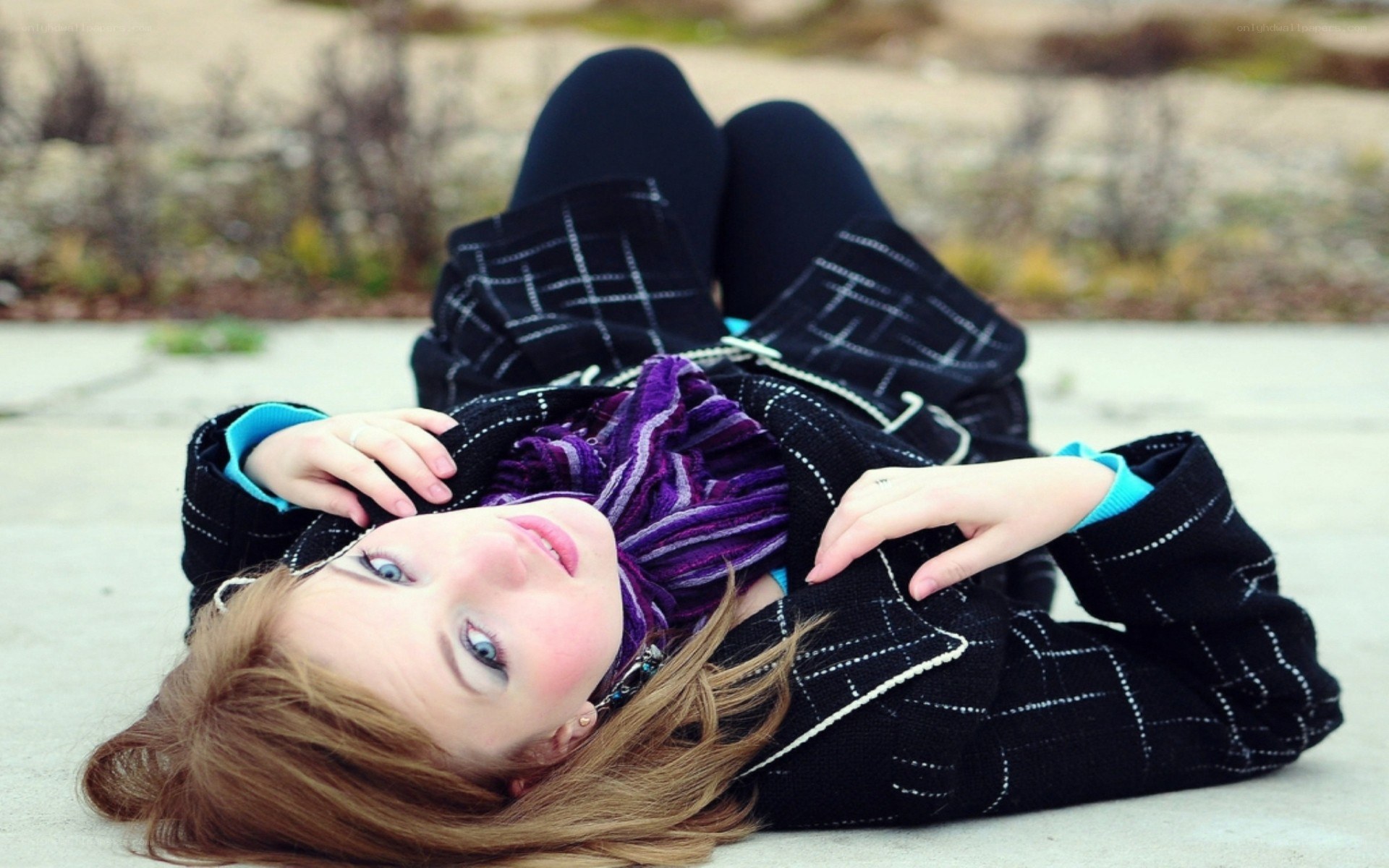 woman lying on ground