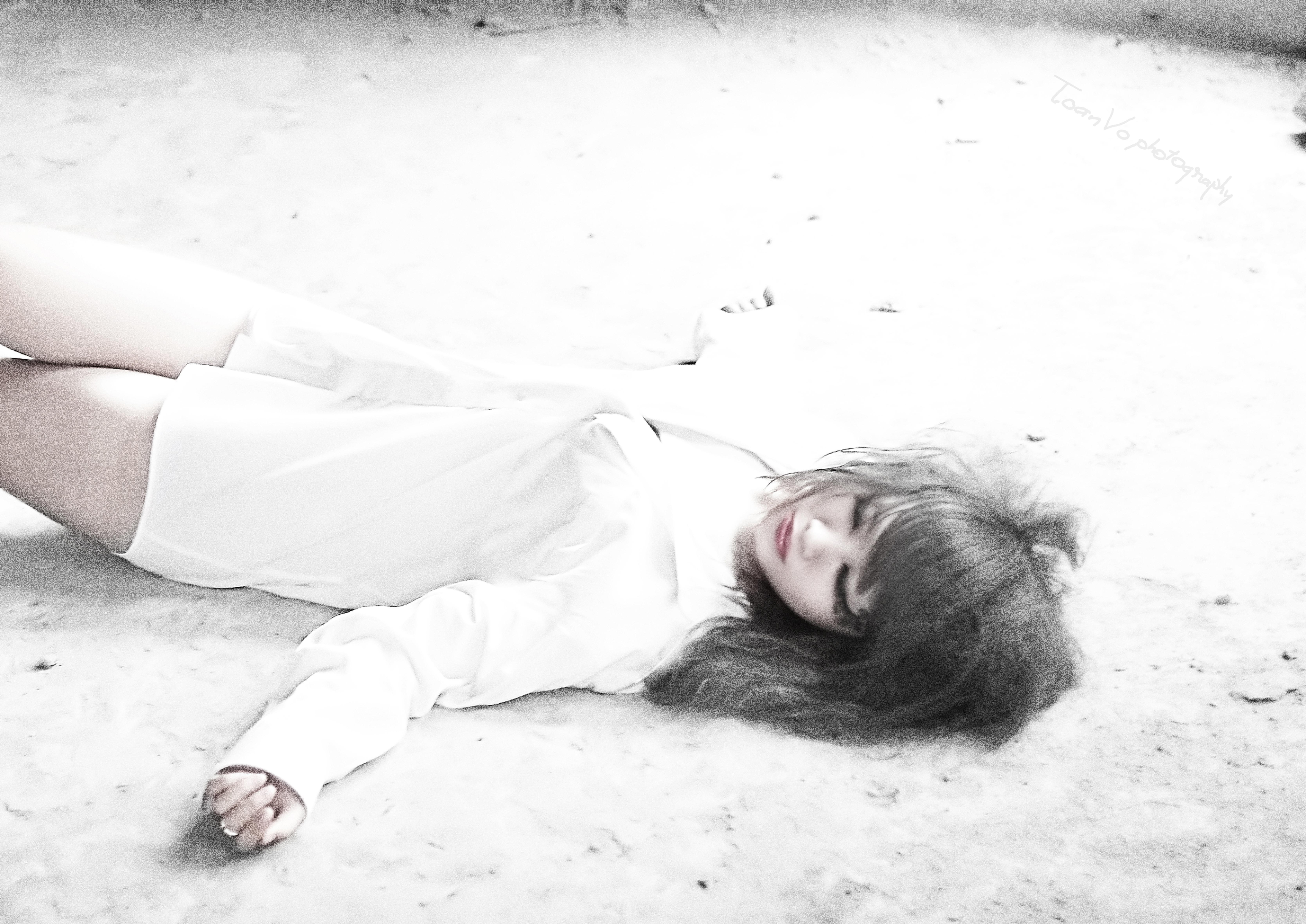 woman lying on ground