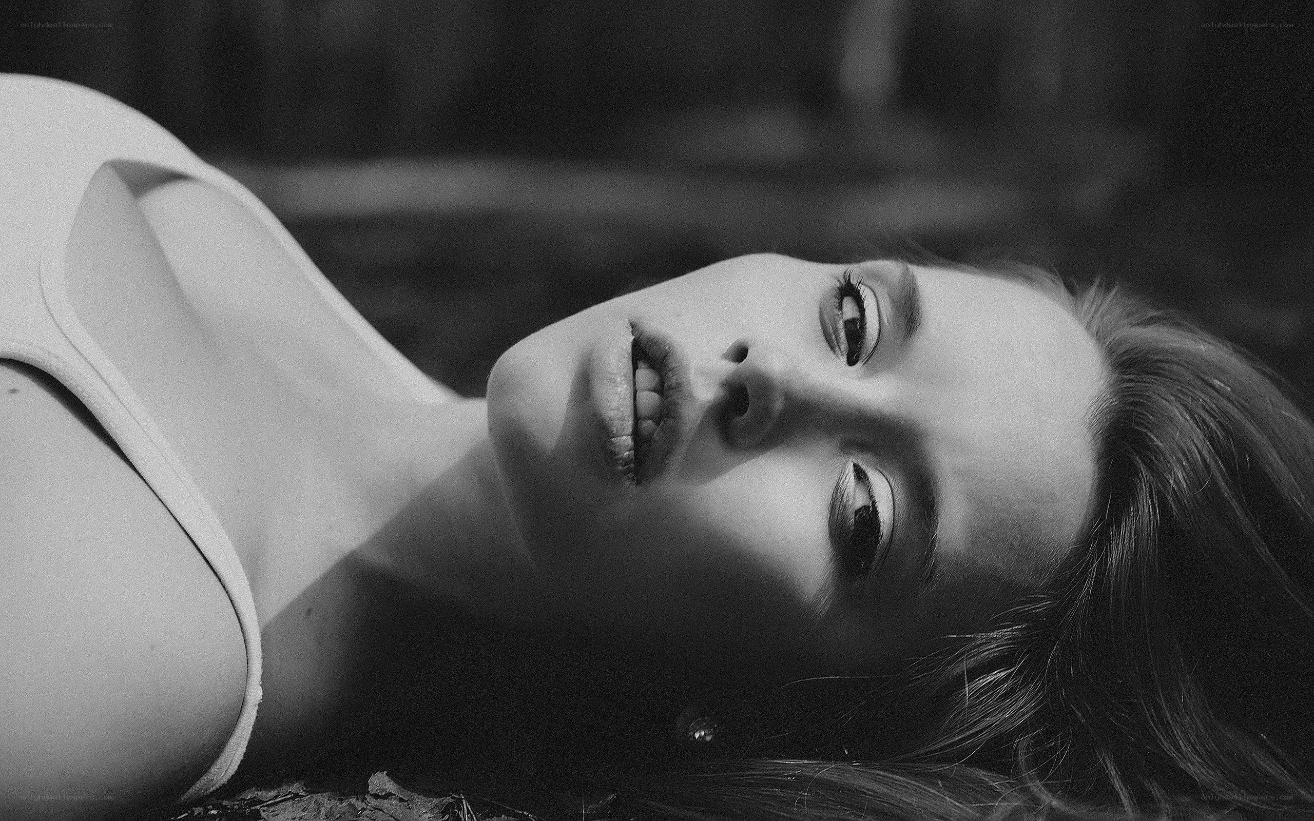 woman lying on ground