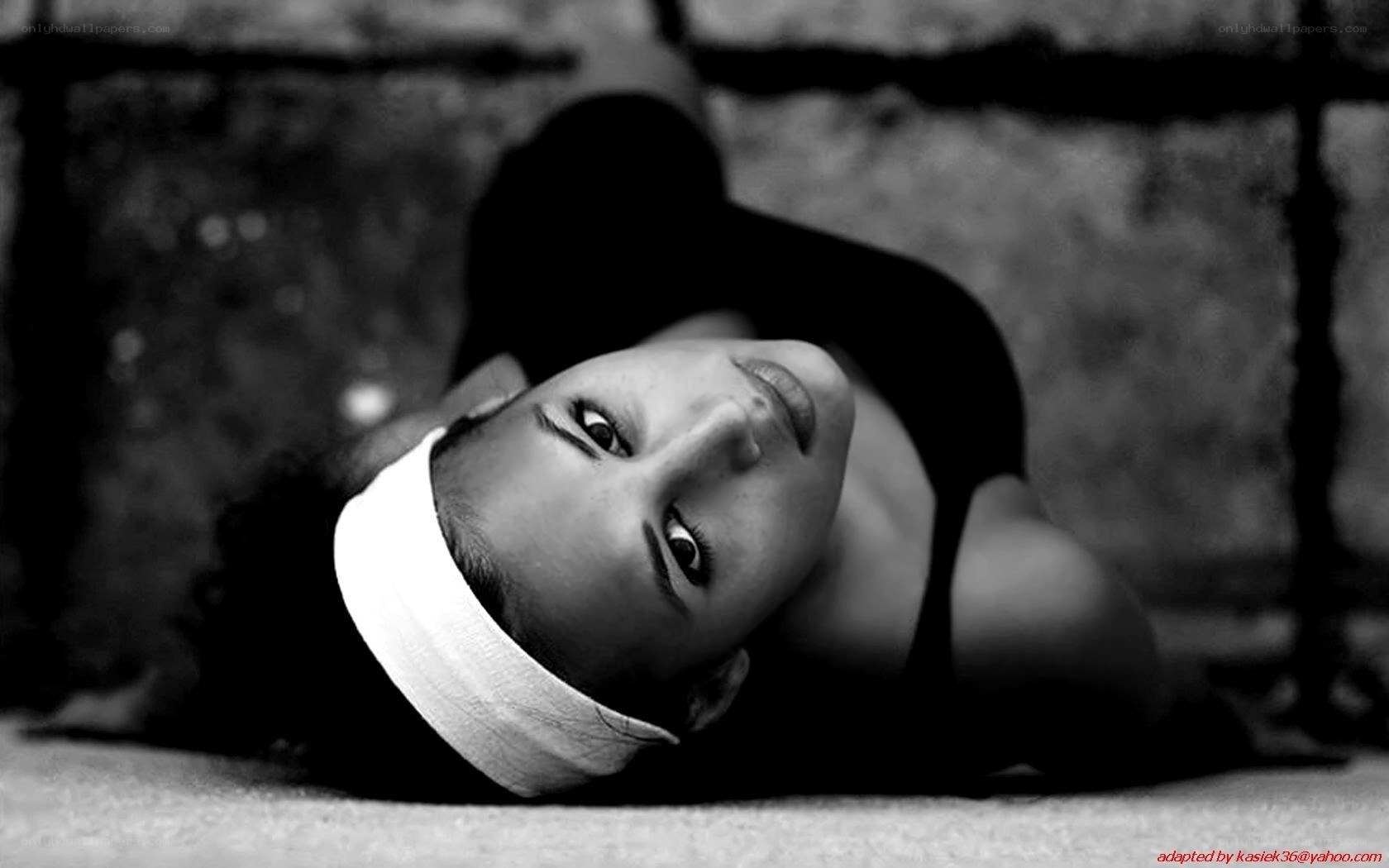 woman lying on ground