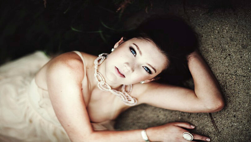 Woman Lying on Ground — Beige