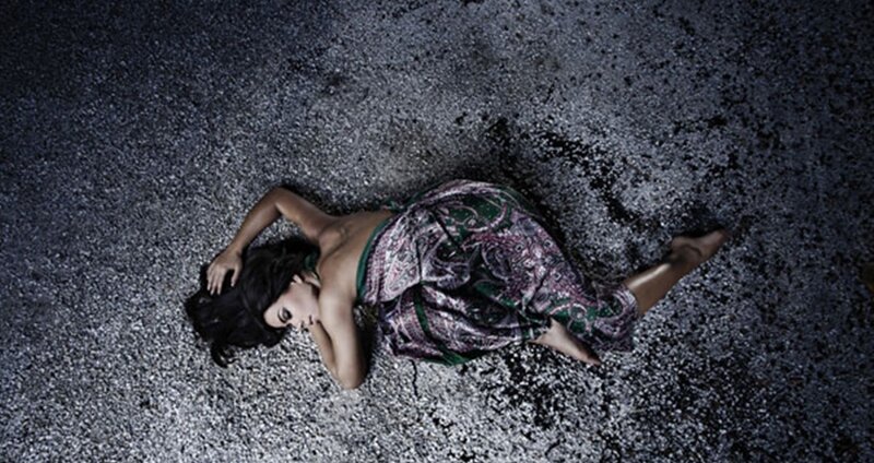 Woman Lying on Ground — Black, Dramatic, Night, Photograph