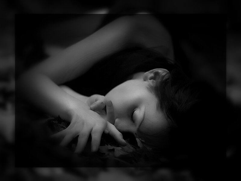 Woman Lying on Ground — Black, Dramatic, Photograph, Hands