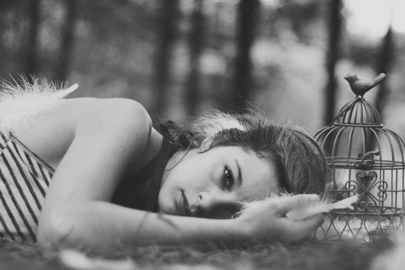 Woman Lying on Ground — Black, Melancholic