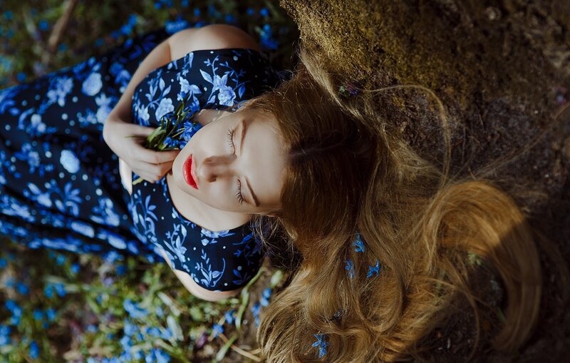 Woman Lying on Ground — Blue, Serene, Afternoon