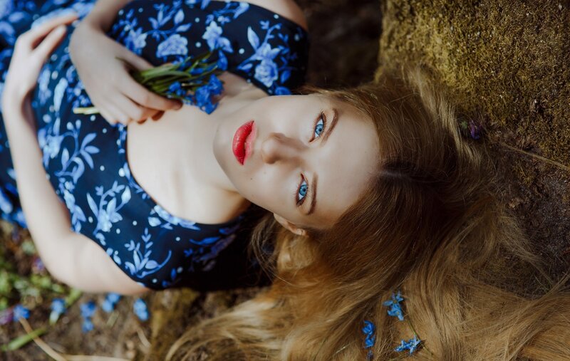 Woman Lying on Ground — Blue, Serene, Spring