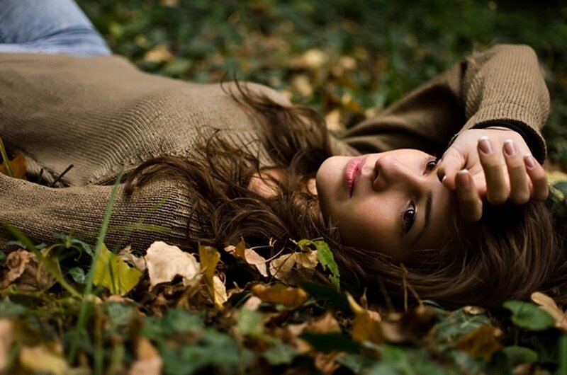 Woman Lying on Ground — Brown, Calm