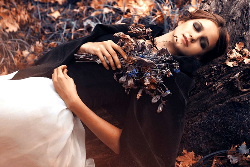 Woman Lying on Ground — Brown, Somber