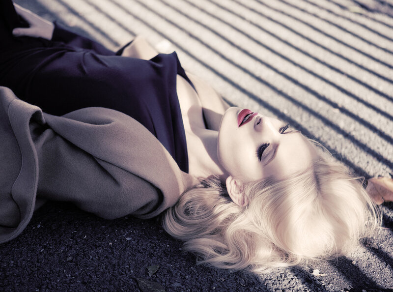 Woman Lying on Ground — Gray, Dramatic, Afternoon