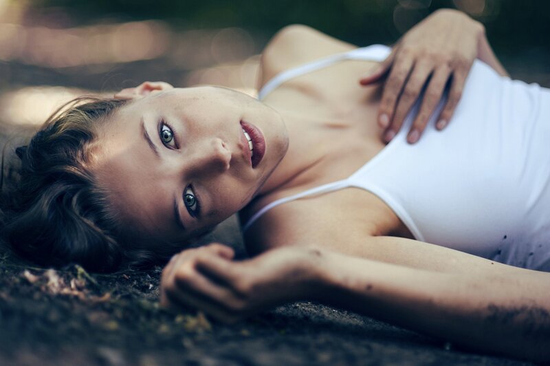 Woman Lying on Ground — White, Calm, Afternoon, Photograph, White Top