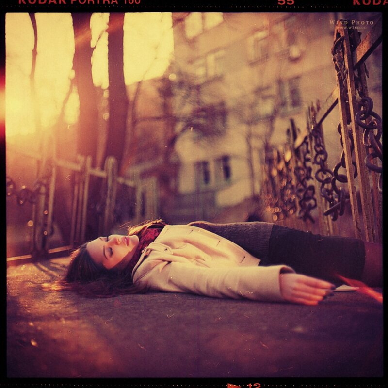 Woman Lying on Ground — Yellow, Dramatic, Sunset