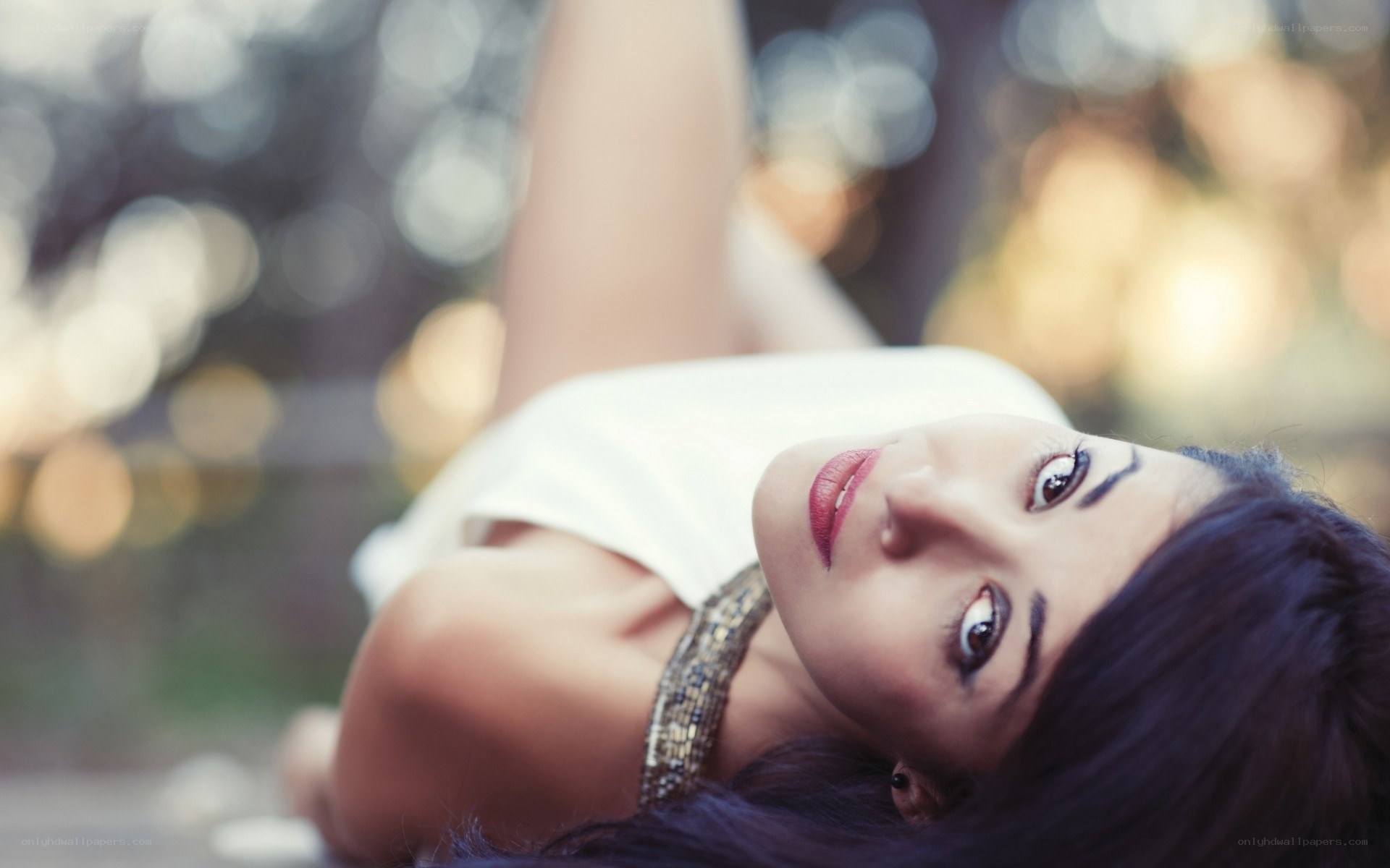 woman lying on ground