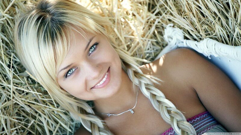 woman lying on hay