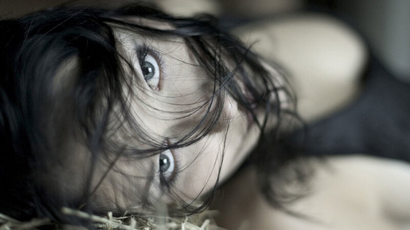 Woman Lying on Hay — Black, Dramatic
