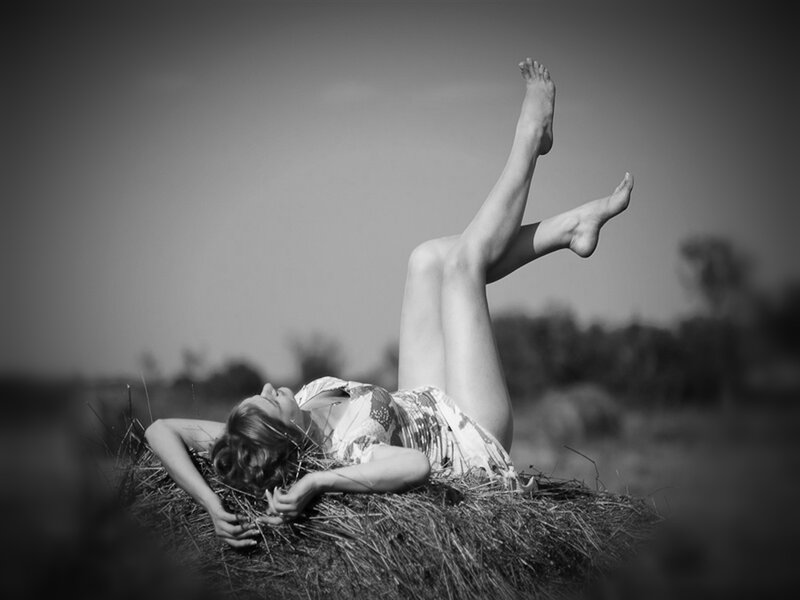 Woman Lying on Hay — Black, Serene