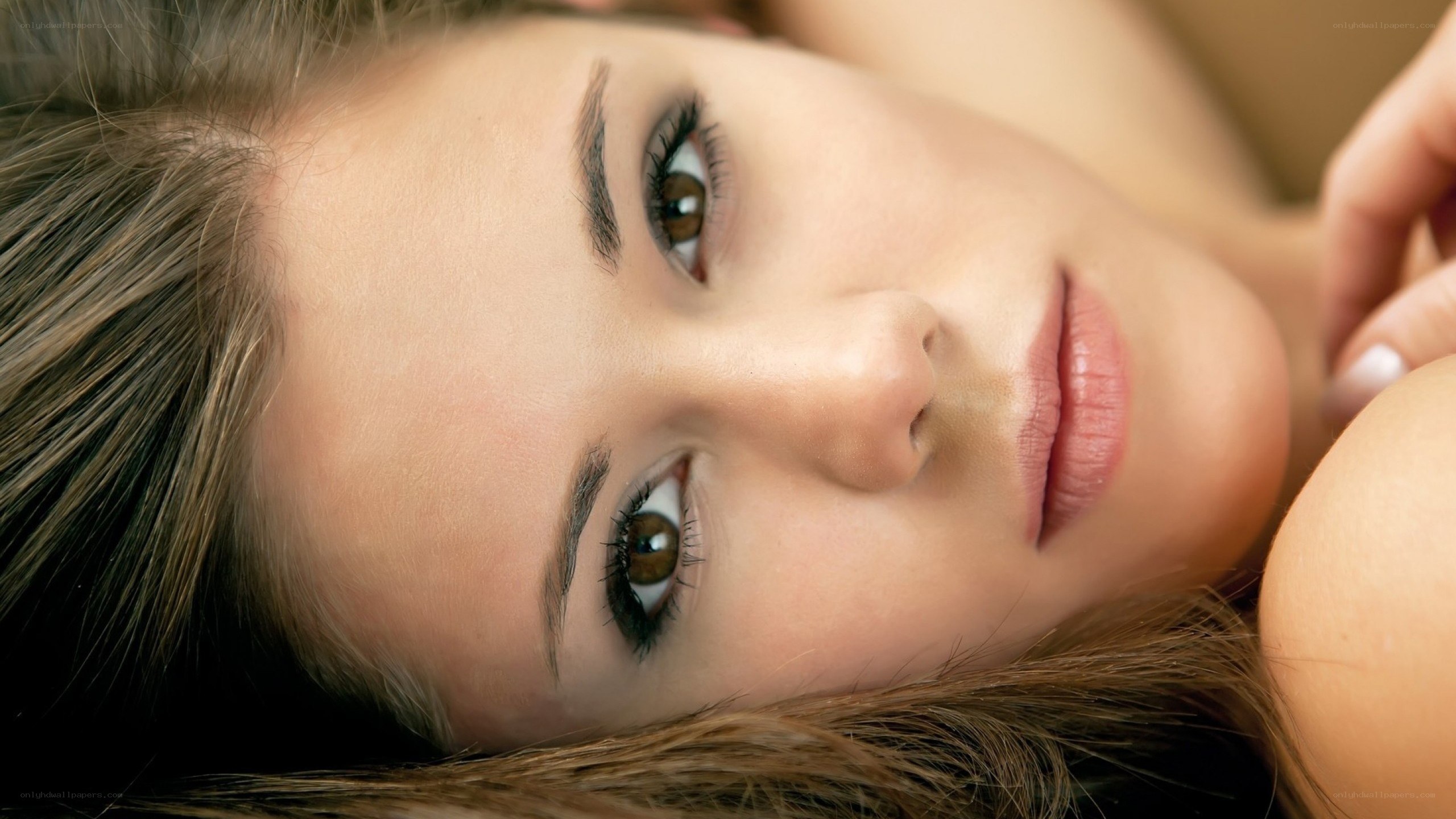 woman lying on her back