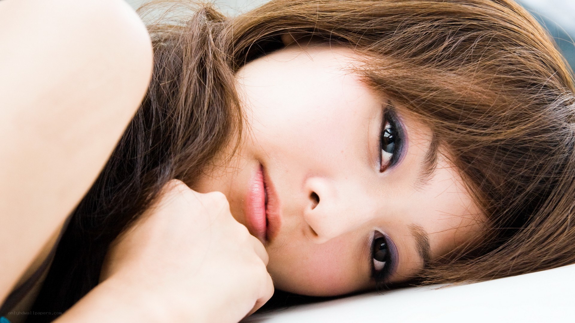 woman lying on her side