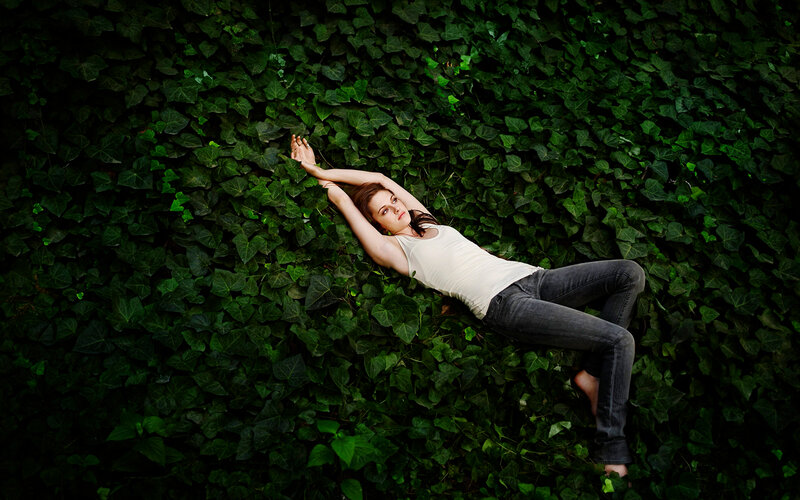 Woman Lying on Ivy — Green, Serene, Photograph