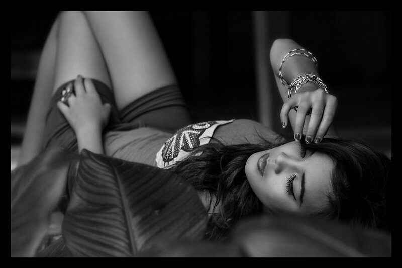Woman Lying on Leaf