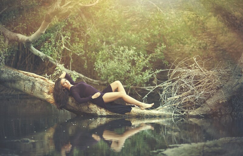 Woman Lying on Log — Green, Serene