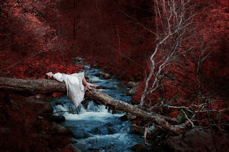 Woman Lying on Log — Red