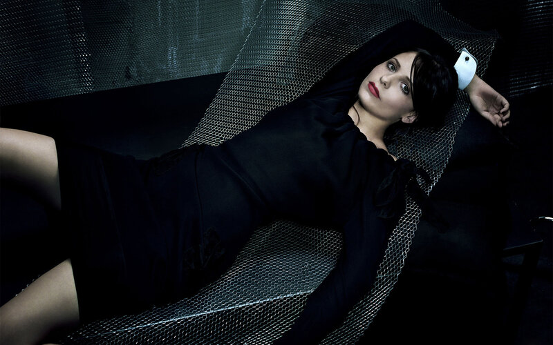 Woman Lying on Mesh Chair