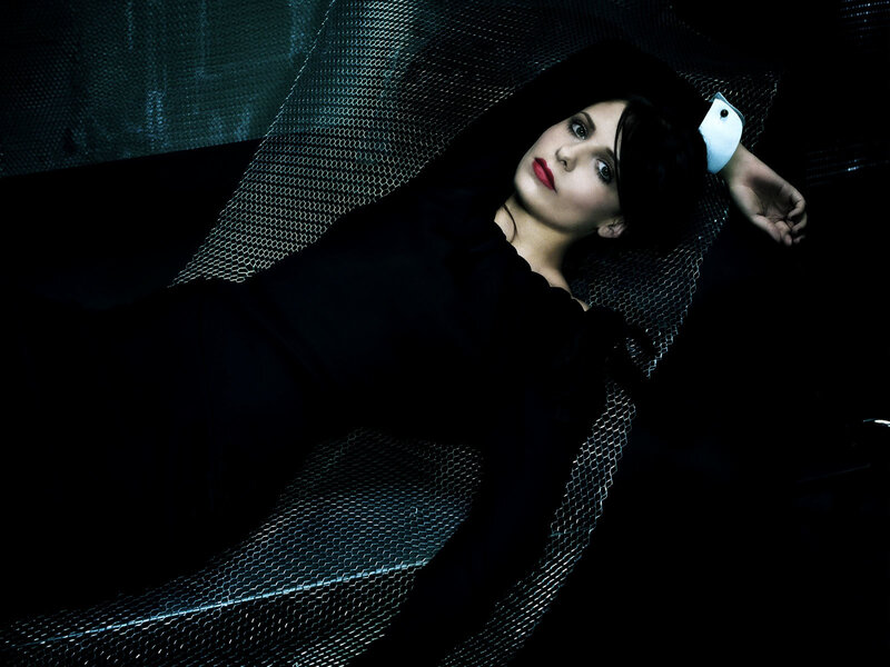 woman lying on mesh surface