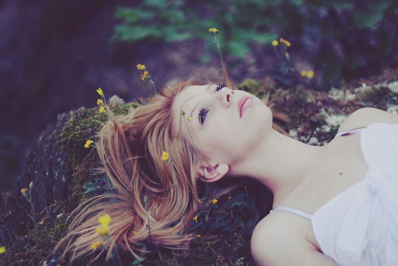 Woman Lying on Moss