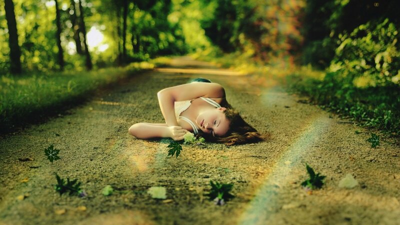 Woman Lying on Path