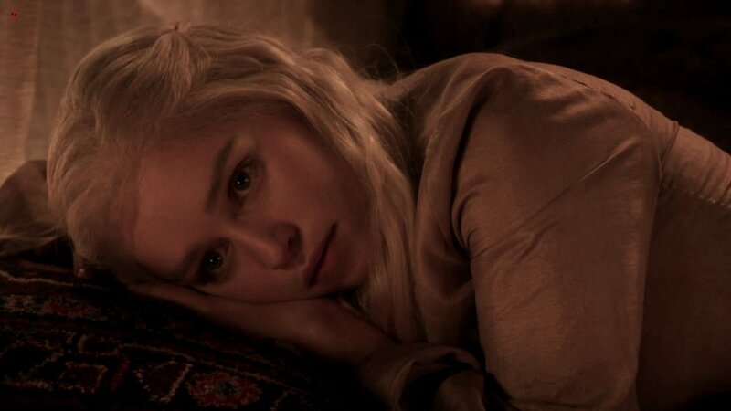 woman lying on patterned rug