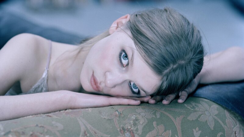 Woman Lying on Patterned Surface — Green