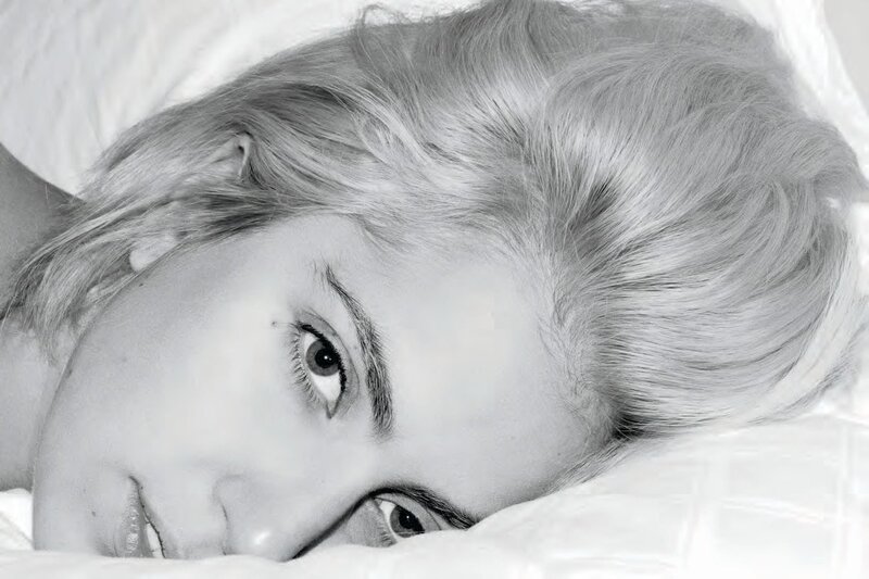 woman lying on pillow