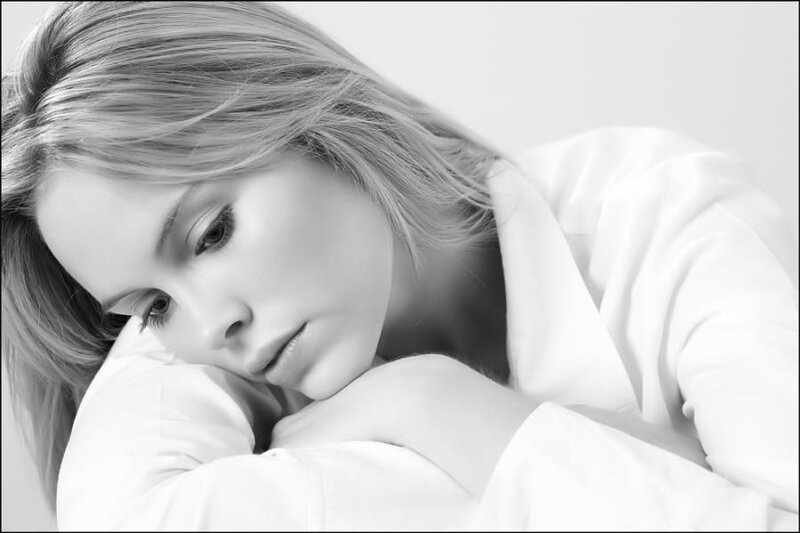 Woman Lying on Pillow — Black, Calm