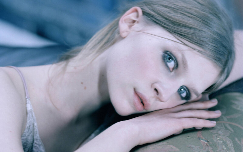 Woman Lying on Pillow — Blue