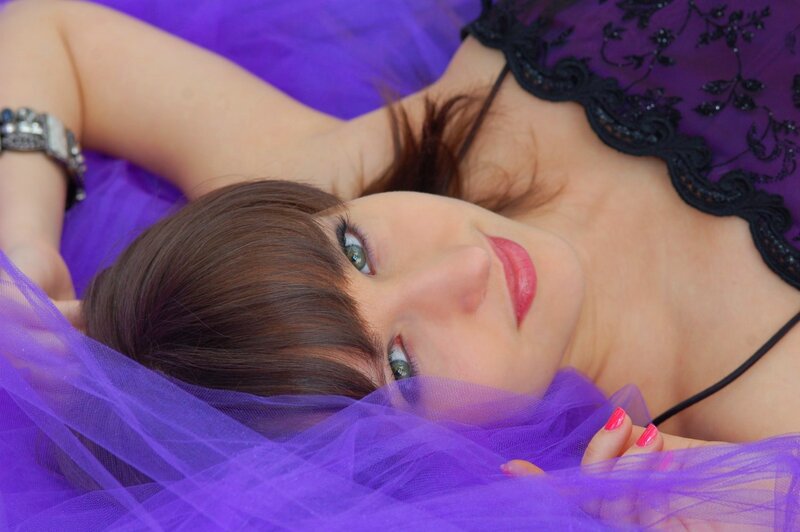 Woman Lying on Purple Fabric — Calm