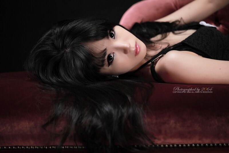 Woman Lying on Red Couch — Black, Dramatic