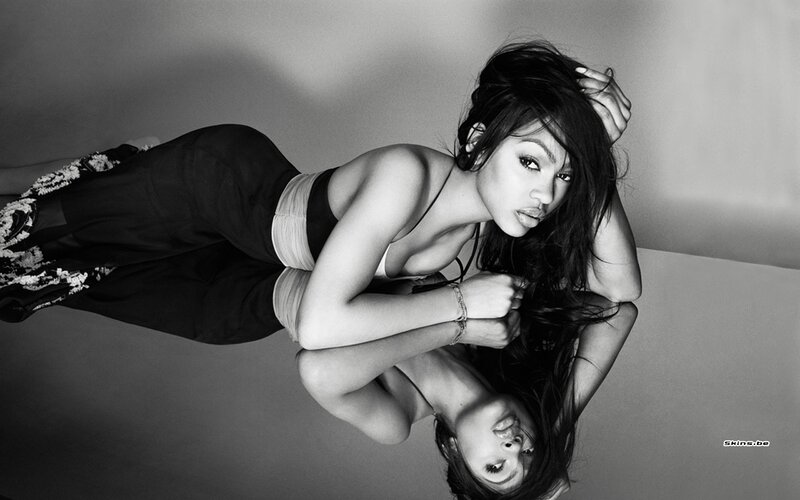 woman lying on reflective surface