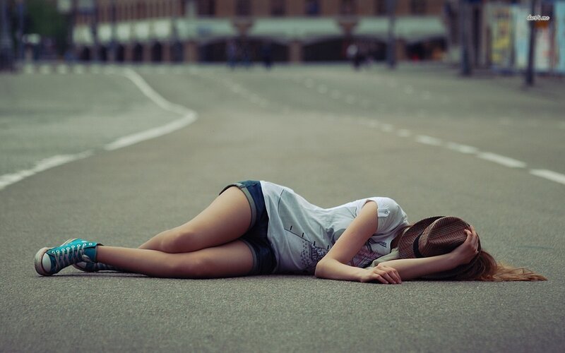 Woman Lying on Road — Gray
