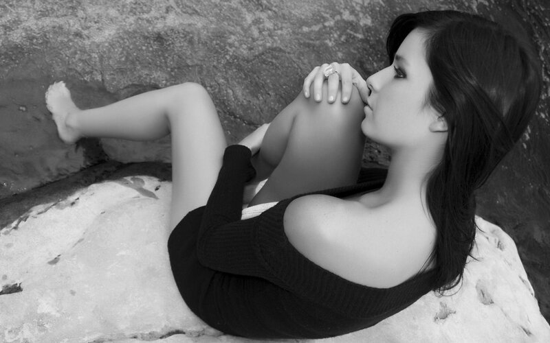 Woman Lying on Rock — Black, Contemplative